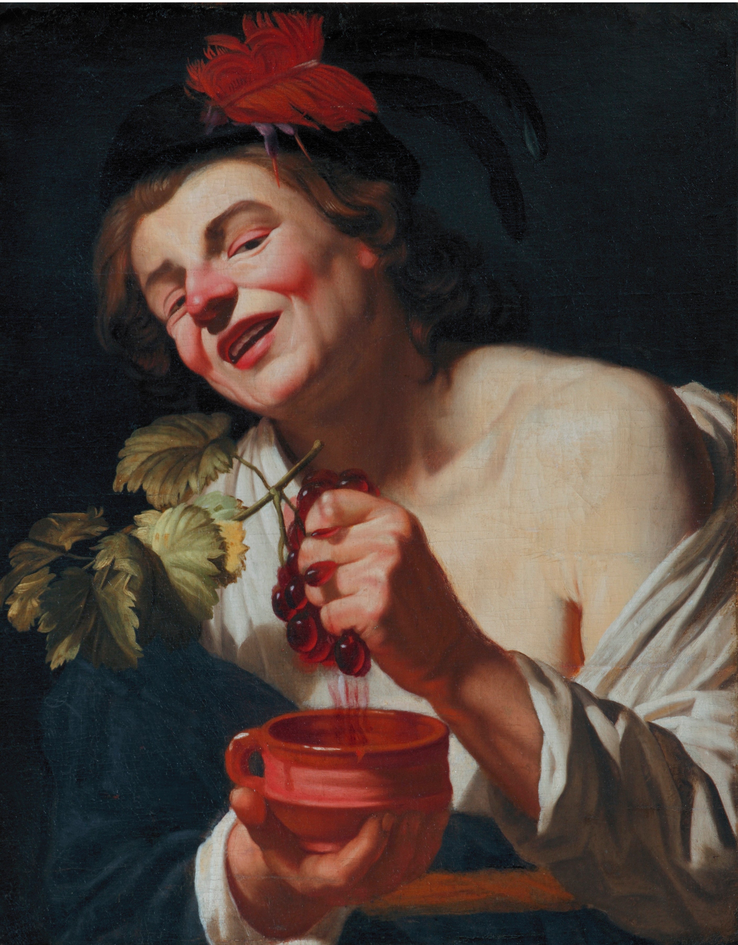 Un jeune homme bachique pressant des raisins dans une coupe (une allégorie du goût ?) - Gerrit van Honthorst